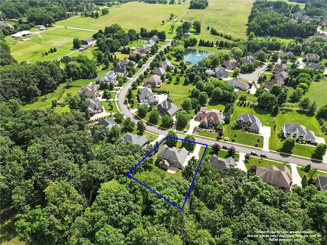 1023 Sophia Ln, Adams Twp, PA 16046 - aerial view of residential area with property parcel outlined and a large body of water
