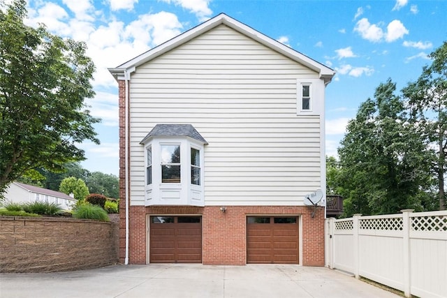 1608 Valley Brooke Ct, Franklin Park, PA 15090 - view of home's exterior featuring concrete driveway, an attached garage, and brick siding