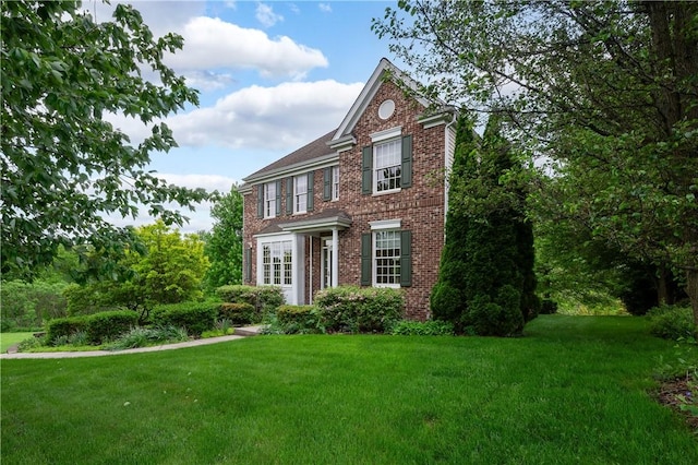 2214 Shannon Mills Dr, Connoquenessing Twp, PA 16053 - colonial house featuring brick siding and a front lawn