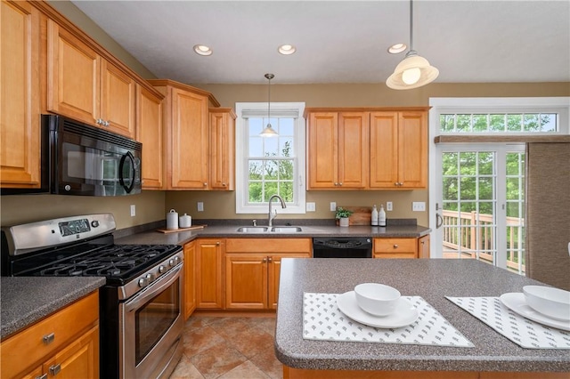 2214 Shannon Mills Dr, Connoquenessing Twp, PA 16053 - kitchen with black appliances, dark countertops, recessed lighting, and pendant lighting