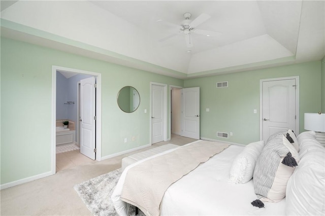 2214 Shannon Mills Dr, Connoquenessing Twp, PA 16053 - bedroom with light carpet, ensuite bathroom, a tray ceiling, and ceiling fan