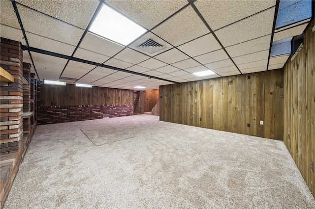 318 E Edgewood Ave, Trafford, PA 15085 - finished basement featuring carpet floors, wood walls, and a drop ceiling