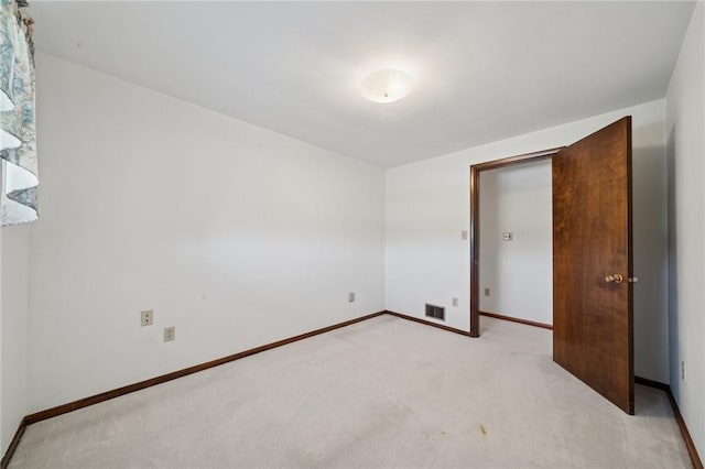 318 E Edgewood Ave, Trafford, PA 15085 - unfurnished bedroom with light carpet and baseboards