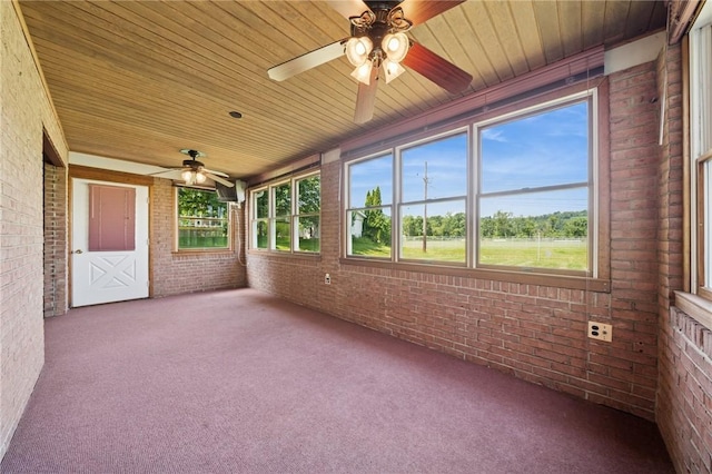 318 E Edgewood Ave, Trafford, PA 15085 - unfurnished sunroom with brick wall, ceiling fan, carpet flooring, and wood ceiling