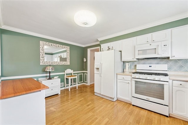 145 Herbst Rd, Kennedy Twp, PA 15108 - kitchen featuring white appliances, white cabinets, crown molding, and light wood-style flooring