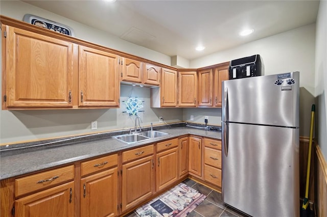 205 Elmhurst Cir, Cranberry Twp, PA 16066 - kitchen with freestanding refrigerator, recessed lighting, and brown cabinetry