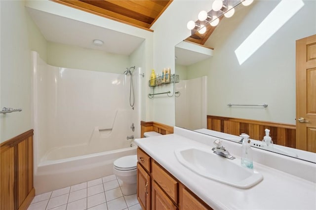 205 Elmhurst Cir, Cranberry Twp, PA 16066 - bathroom featuring wainscoting, vanity, a skylight, shower / tub combination, and tile patterned flooring