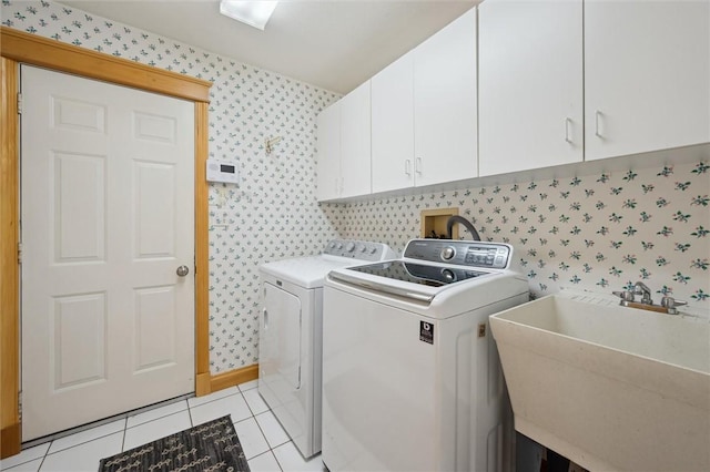 205 Elmhurst Cir, Cranberry Twp, PA 16066 - laundry room featuring washer and dryer, cabinet space, wallpapered walls, and light tile patterned flooring