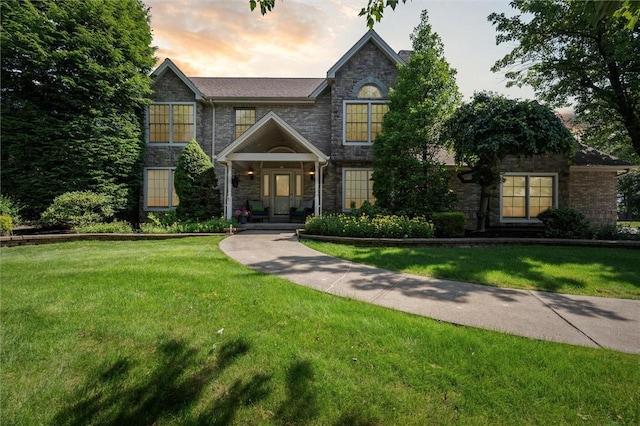 205 Elmhurst Cir, Cranberry Twp, PA 16066 - traditional-style home featuring stone siding and a front lawn