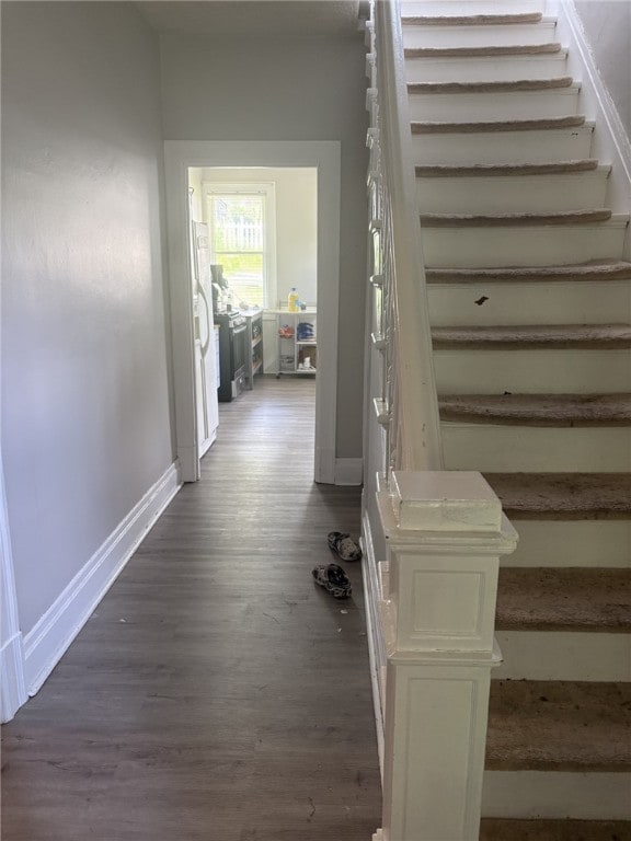 150 N Ave E, Pittsburgh, PA 15112 - staircase featuring baseboards and wood finished floors