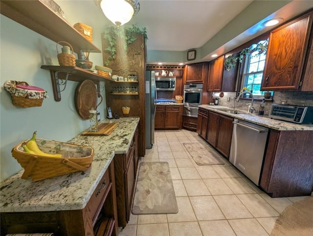 426 Unionville Rd, Franklin Twp, PA 16001 - kitchen featuring open shelves, stainless steel appliances, light tile patterned flooring, tasteful backsplash, and light stone counters
