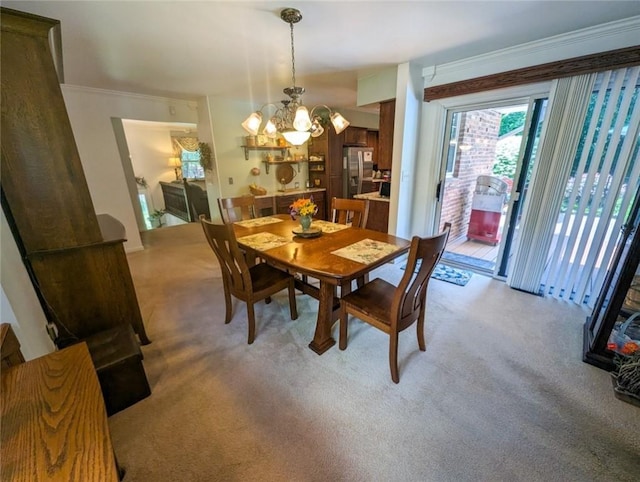 426 Unionville Rd, Franklin Twp, PA 16001 - dining space featuring light colored carpet, a chandelier, and crown molding
