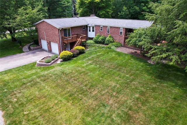 426 Unionville Rd, Franklin Twp, PA 16001 - single story home featuring brick siding, driveway, an attached garage, a wooden deck, and a front lawn