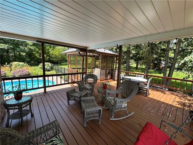 426 Unionville Rd, Franklin Twp, PA 16001 - deck with a sunroom and outdoor dining area