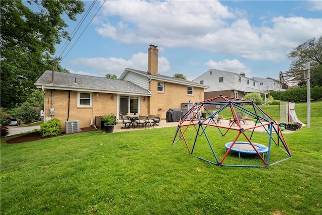 569 Pat Haven Dr, Mt Lebanon, PA 15243 - rear view of property featuring brick siding, a patio, a yard, and a chimney