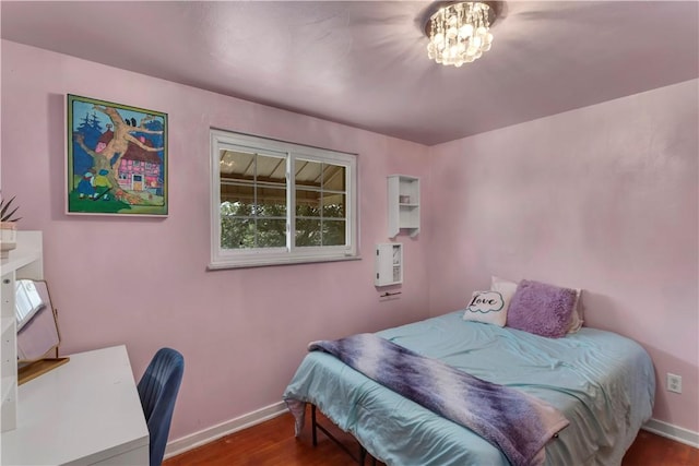 117 Mcmasters Dr, Monroeville, PA 15146 - bedroom featuring wood finished floors and a chandelier