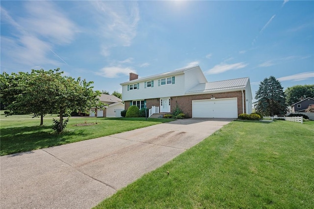 125 Jackson St, White Twp, PA 15701 - colonial inspired home featuring a chimney, a front yard, brick siding, a garage, and driveway