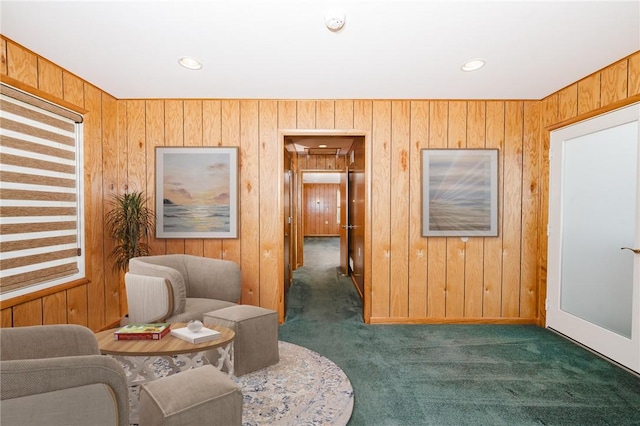 125 Jackson St, White Twp, PA 15701 - living area featuring dark colored carpet, wooden walls, and recessed lighting