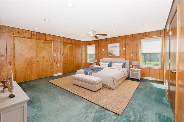 125 Jackson St, White Twp, PA 15701 - bedroom featuring recessed lighting, wooden walls, dark colored carpet, and a ceiling fan