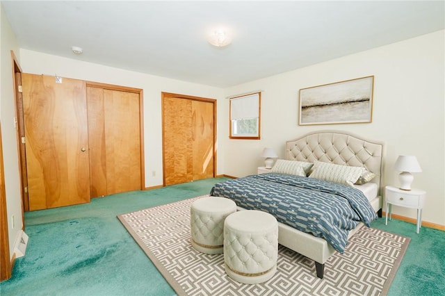 125 Jackson St, White Twp, PA 15701 - carpeted bedroom featuring two closets and baseboards