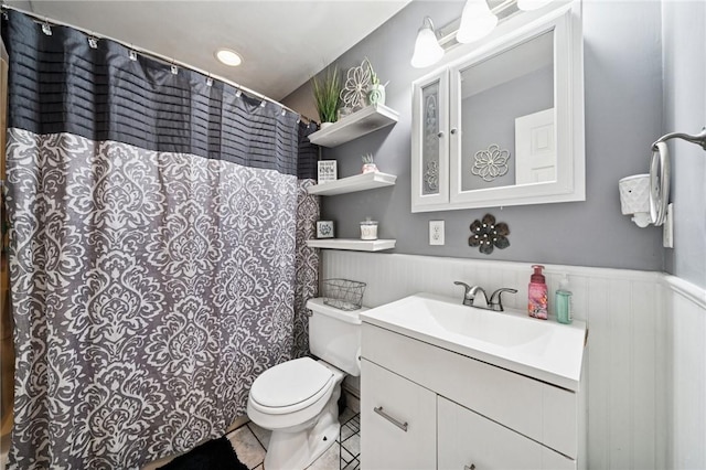 3640 Bakerstown Rd, Richland, PA 15044 - full bathroom featuring vanity, wainscoting, tile patterned flooring, and curtained shower