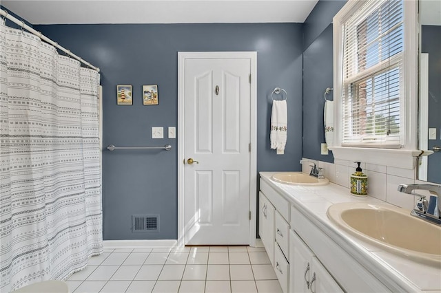 1100 Eleanor Pl, Adams Twp, PA 15044 - bathroom featuring double vanity, plenty of natural light, tile patterned flooring, and a shower with curtain