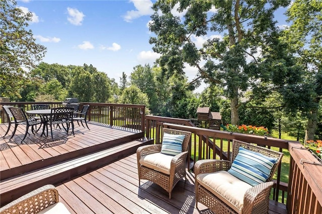 1100 Eleanor Pl, Adams Twp, PA 15044 - deck with outdoor dining space and view of wooded area