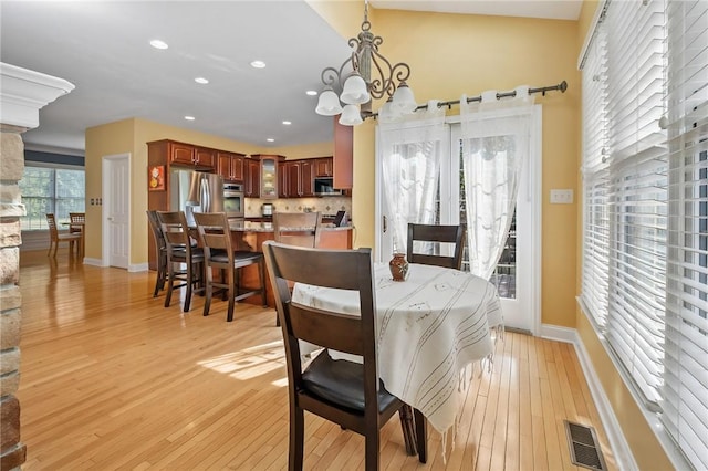1100 Eleanor Pl, Adams Twp, PA 15044 - dining area featuring light wood-style flooring, recessed lighting, and a chandelier