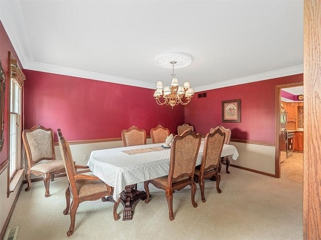 4273 River Rd, North Sewickley Twp, PA 15010 - dining space featuring carpet, crown molding, and a chandelier