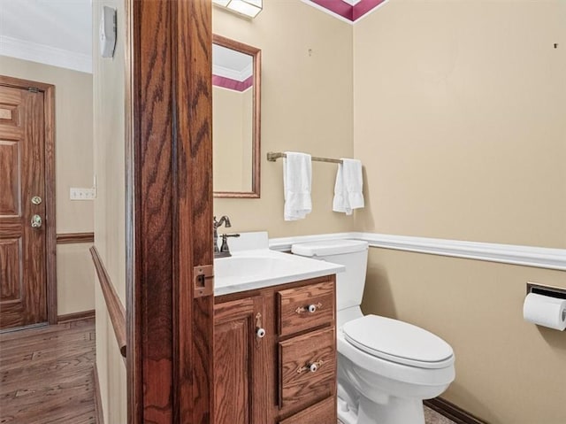 4273 River Rd, North Sewickley Twp, PA 15010 - half bathroom with vanity, crown molding, and wood finished floors