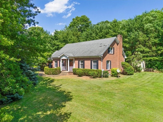 4273 River Rd, North Sewickley Twp, PA 15010 - view of front facade featuring brick siding, a front yard, and a chimney
