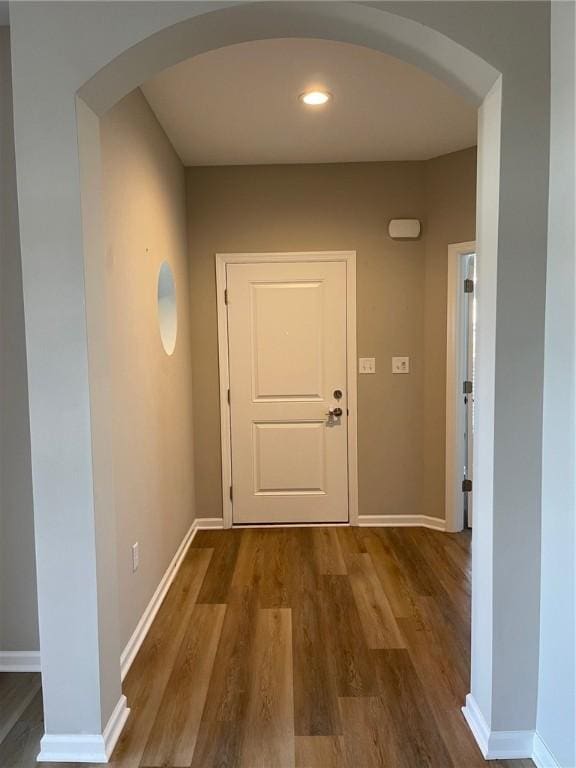4252 Hawthorn Dr, South Park, PA 15129 - corridor featuring arched walkways and wood finished floors