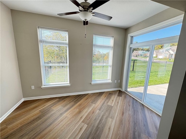 4252 Hawthorn Dr, South Park, PA 15129 - empty room with wood finished floors and a ceiling fan