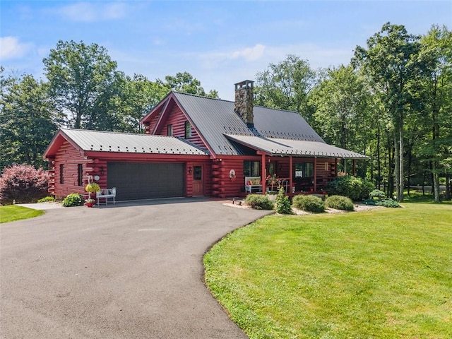 207 High Acres Rd, Lancaster Twp, PA 16037 - log home featuring log siding, an attached garage, a front lawn, and a chimney