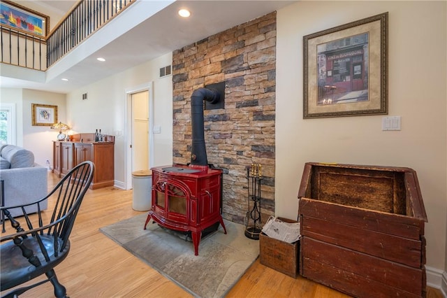 16 Mcdowell Rd, Ligonier Twp, PA 15658 - living area with a wood stove, wood finished floors, and recessed lighting