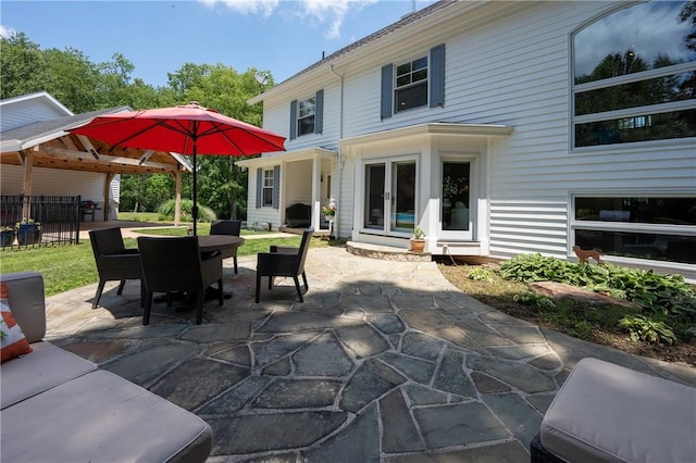 16 Mcdowell Rd, Ligonier Twp, PA 15658 - view of patio featuring outdoor dining area and french doors