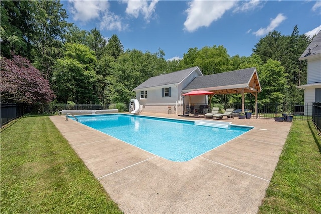 16 Mcdowell Rd, Ligonier Twp, PA 15658 - view of swimming pool featuring a fenced backyard, a patio area, a water slide, and view of scattered trees