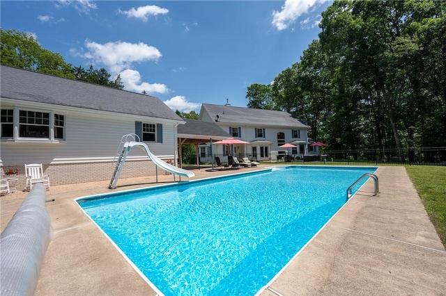 16 Mcdowell Rd, Ligonier Twp, PA 15658 - view of pool with a water slide and a patio