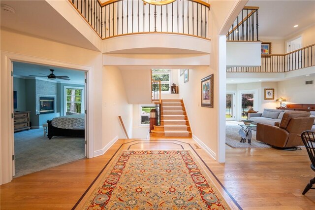 16 Mcdowell Rd, Ligonier Twp, PA 15658 - entryway with a high ceiling, light wood finished floors, stairway, and a ceiling fan