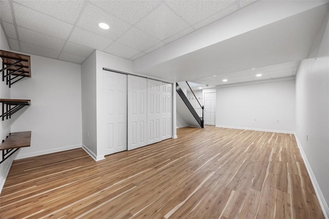 116 Stonegate Dr, North Strabane, PA 15317 - finished below grade area featuring stairway, light wood finished floors, recessed lighting, and a paneled ceiling