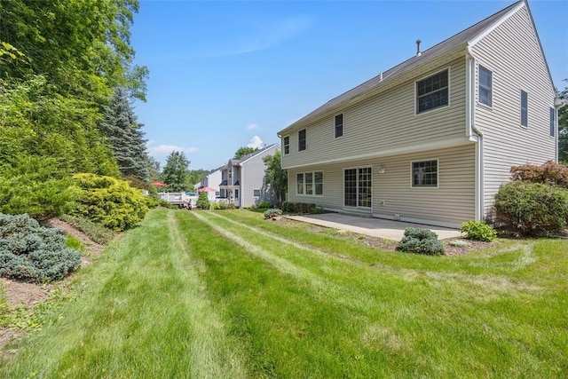 116 Stonegate Dr, North Strabane, PA 15317 - rear view of property with a patio area and a lawn