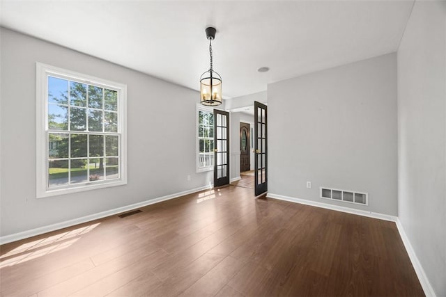 116 Stonegate Dr, North Strabane, PA 15317 - empty room featuring dark wood-style floors and a chandelier