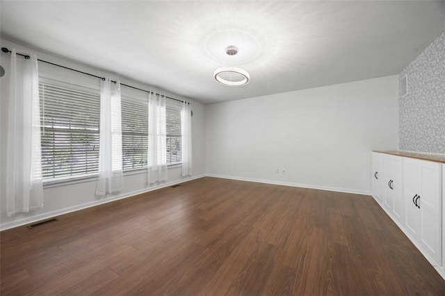 116 Stonegate Dr, North Strabane, PA 15317 - spare room with dark wood-style flooring and baseboards