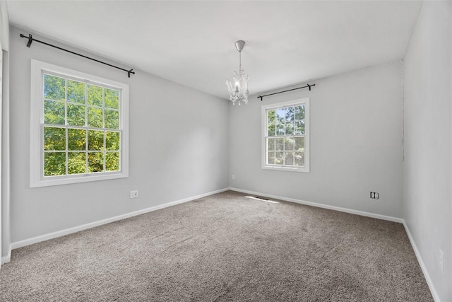 116 Stonegate Dr, North Strabane, PA 15317 - empty room with a chandelier and carpet floors