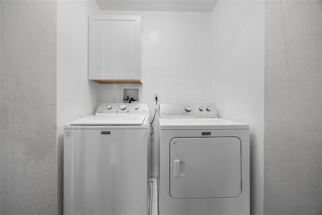 116 Stonegate Dr, North Strabane, PA 15317 - laundry area featuring washing machine and clothes dryer and cabinet space