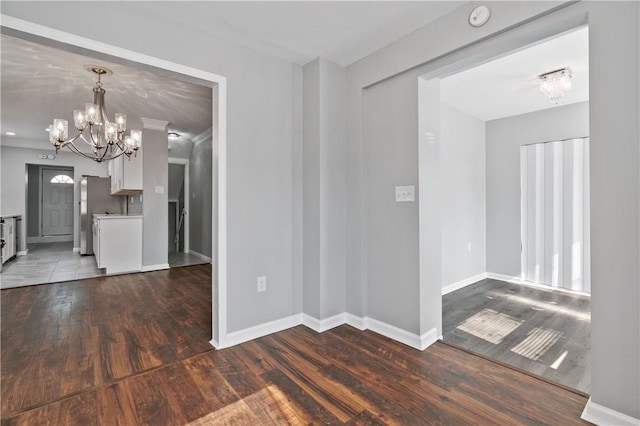 200 Thomas St, West Mifflin, PA 15122 - unfurnished dining area with a chandelier and dark wood-type flooring