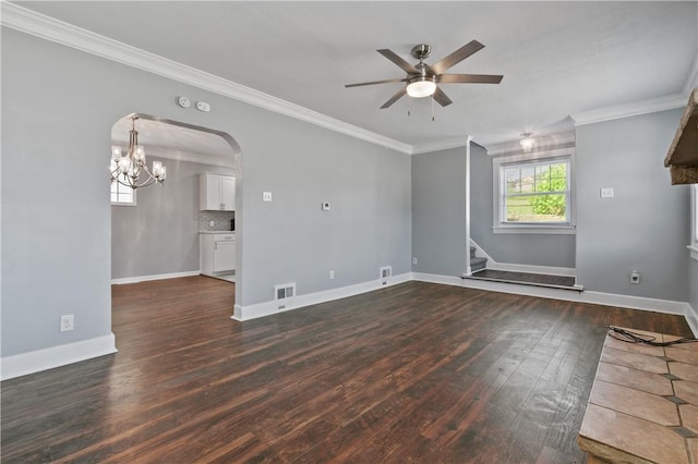 200 Thomas St, West Mifflin, PA 15122 - spare room featuring a ceiling fan, dark wood-style floors, stairway, arched walkways, and crown molding