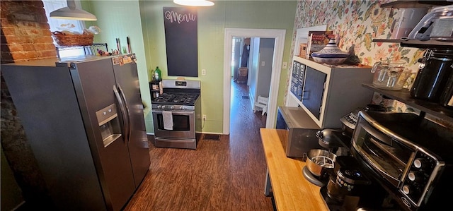 216 N Sprague Ave, Bellevue, PA 15202 - kitchen featuring stainless steel appliances, dark wood finished floors, and wallpapered walls