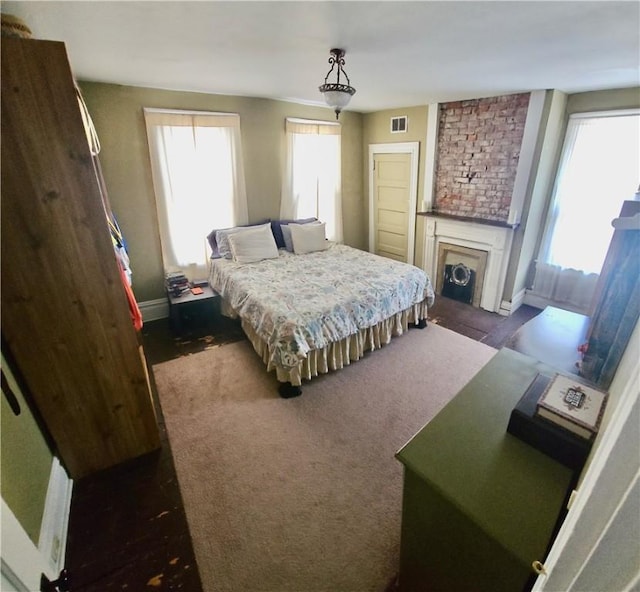 216 N Sprague Ave, Bellevue, PA 15202 - bedroom with a fireplace and baseboards