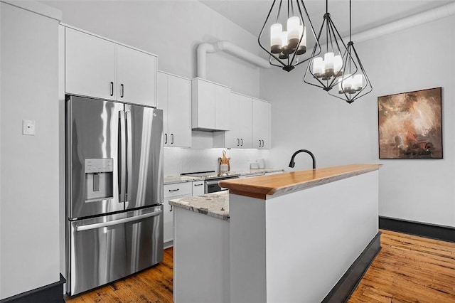 3080 Smallman St, Downtown Pgh, PA 15201 - kitchen featuring stainless steel refrigerator with ice dispenser, a chandelier, white cabinetry, and dark wood-type flooring